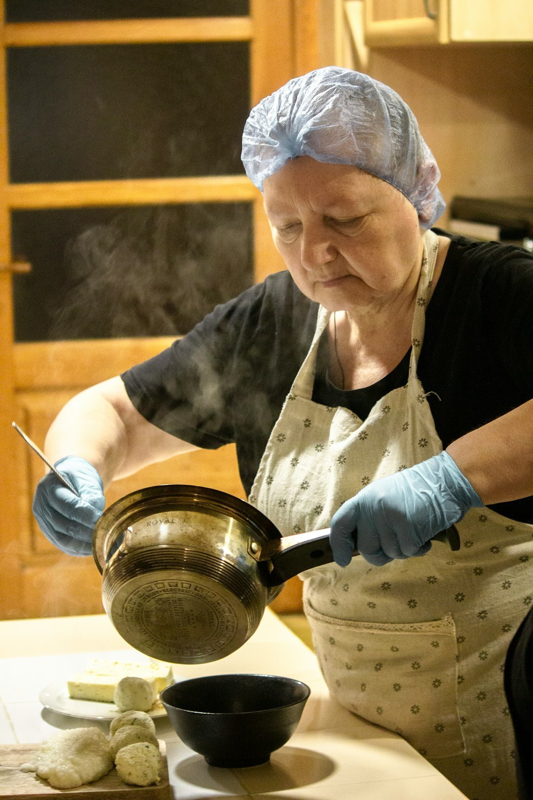 Seniors learning to cook together in a cooking workshop